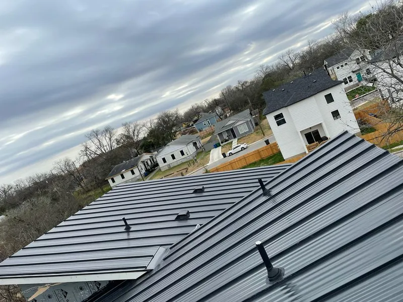 Standing seam metal roof panels with vents for Skylight Repair in On Top of the World